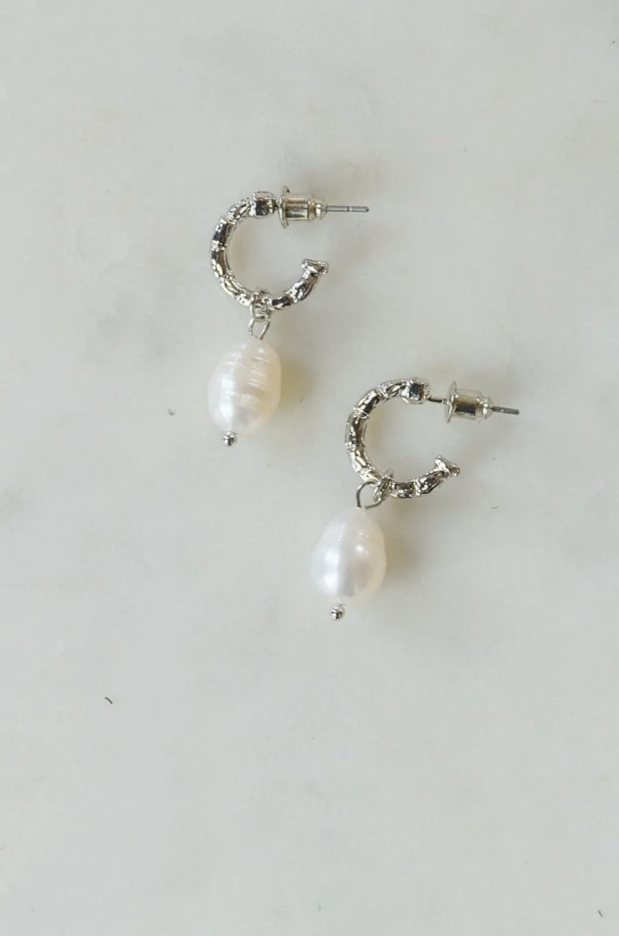 Drops Of Pearl Earrings In Silver