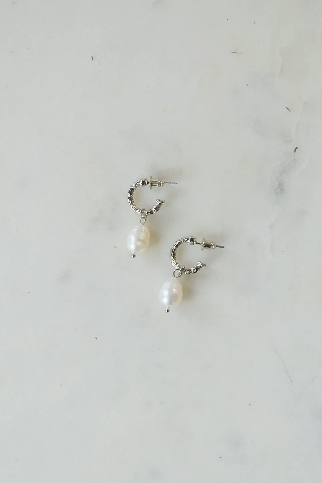 Drops Of Pearl Earrings In Silver